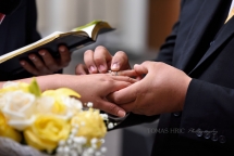Groom putting a ring on bride Wedding in silver springs bethesda maryland washington DC tomas hric photography